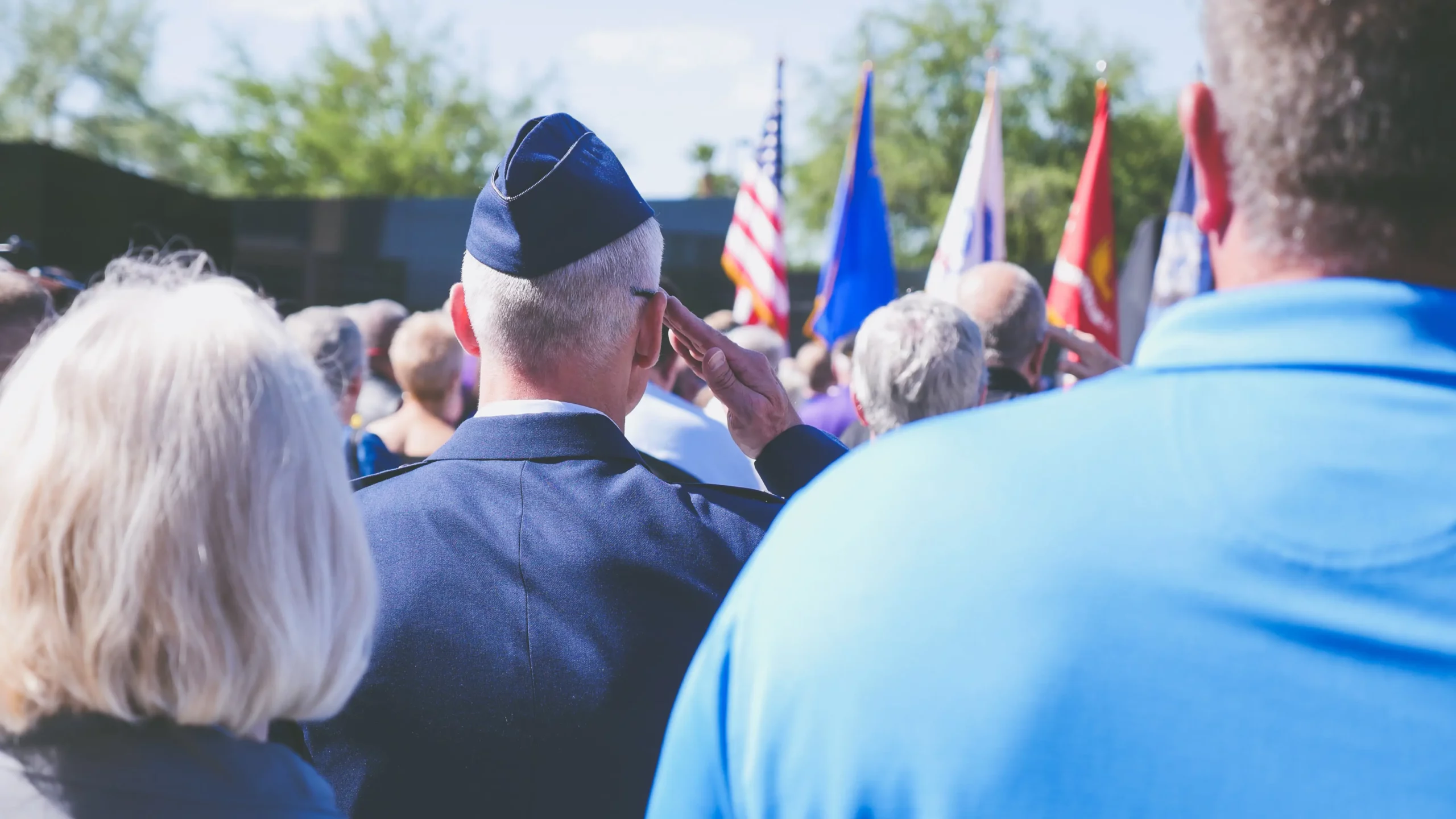 veteran-saluting-flags